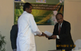 Indika Weerasinghe, accepting the certificate